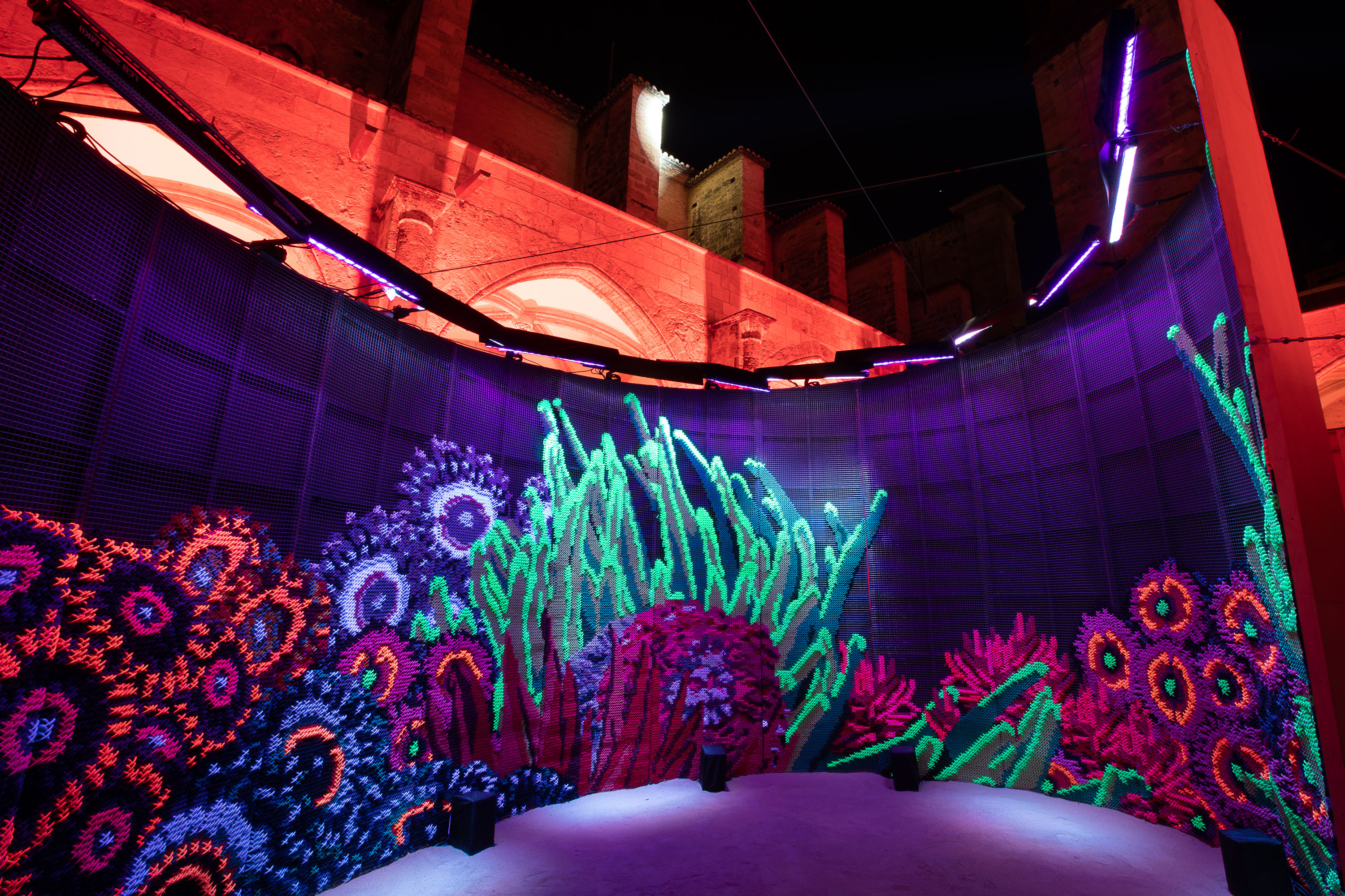 Efluenow — fluorescent embroidery installation at night, Centre del Carme Valencia