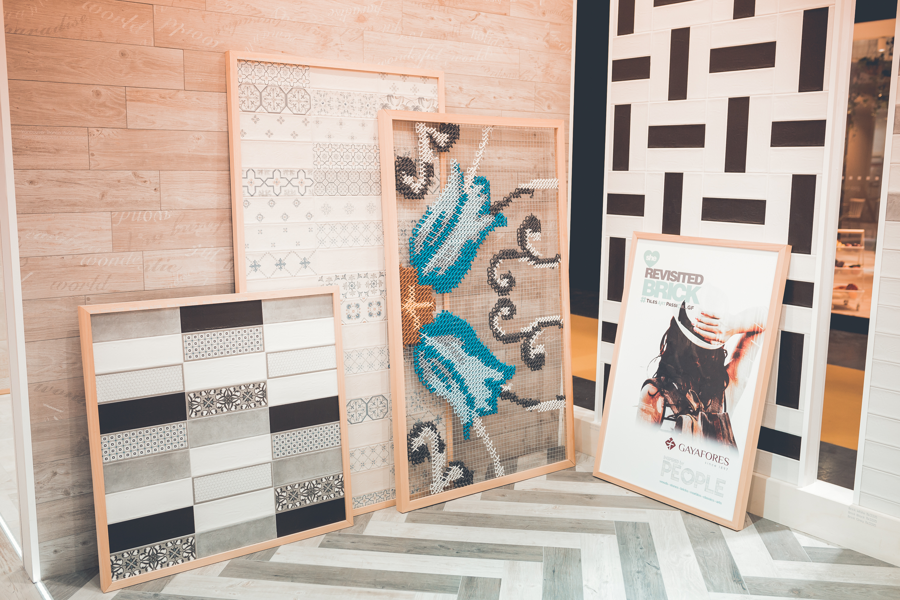 Gayafores — smaller framed embroidered panels alongside tile samples