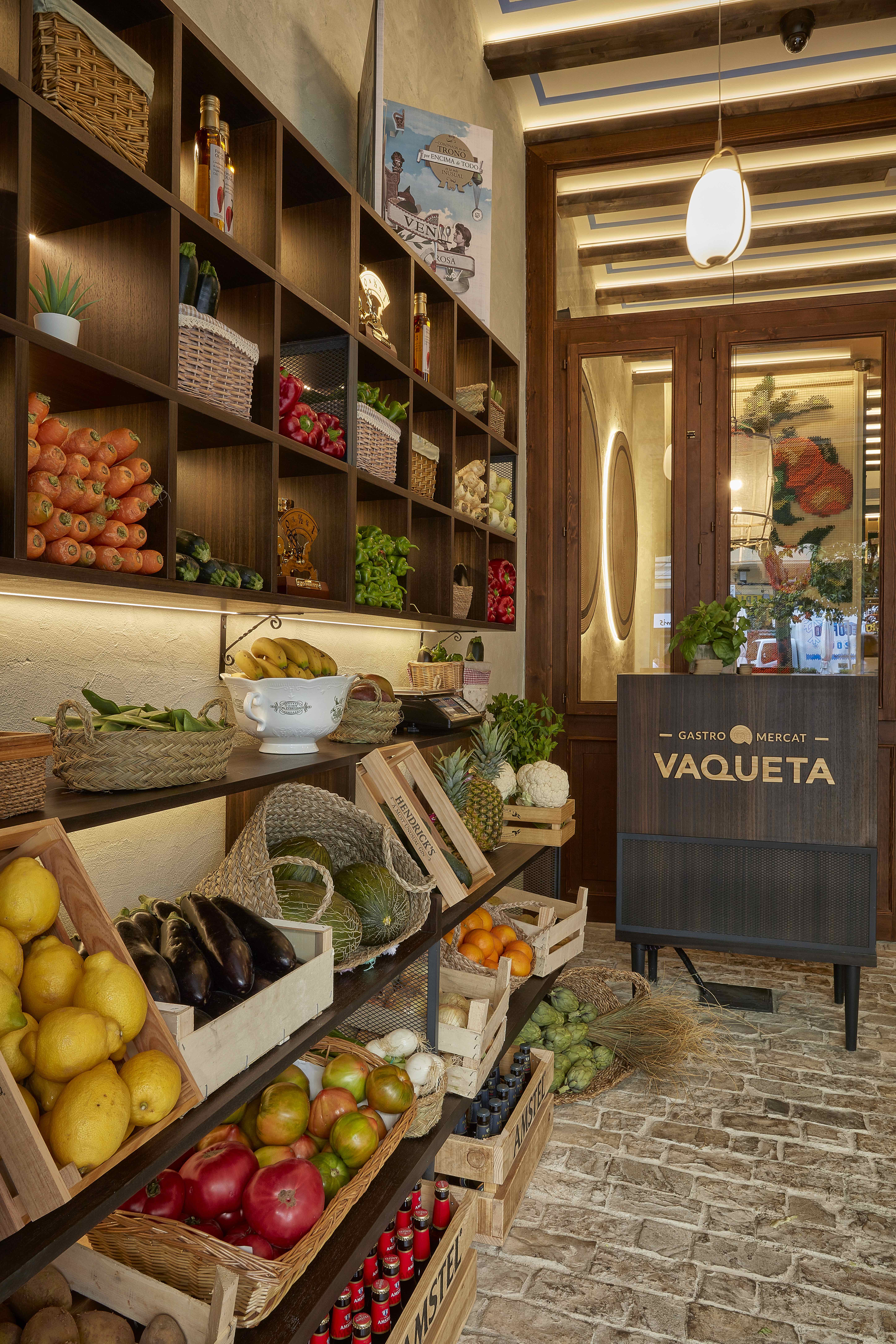 Vaqueta — greengrocer entrance with embroidery visible in background